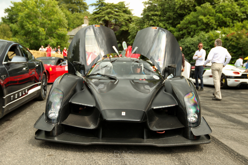 Illustration for article titled Listen To The Wild SCG 003 As It Runs Up The Goodwood Hill